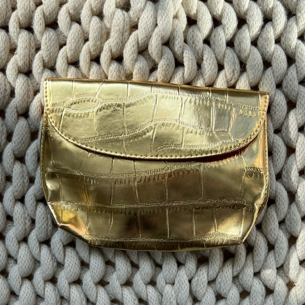 Small gold Estee Lauder makeup bag/clutch